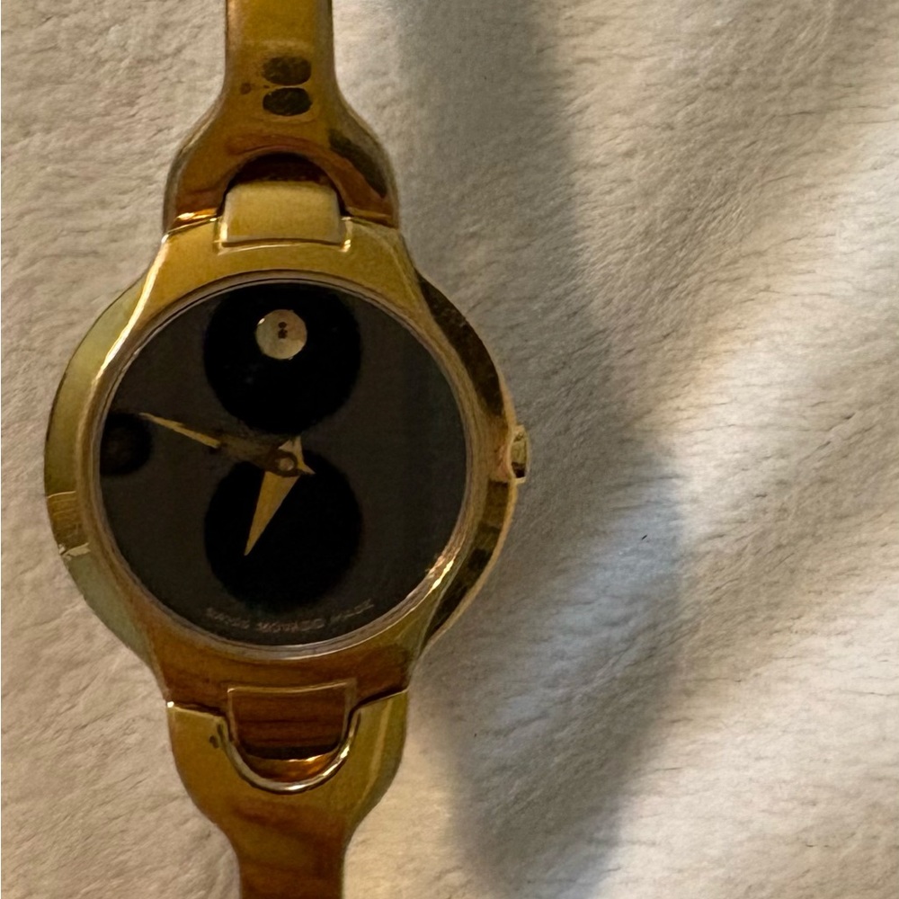 Movado Gold-Tone Round Face Women's Watch with Black Dial